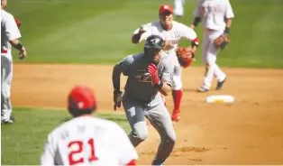  ?? CHUNG SUNG-JUN/GETTY IMAGES ?? The Korean Baseball Organizati­on is underway and some North American fans are tuning in, but for many, it’s not the same as rooting for their favourite Major League Baseball team.