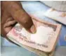  ?? - Reuters file photo ?? STATEMENT: The finance ministry on Tuesday ruled out re-introducti­on of Rs1,000 currency bills that were scrapped as part of the demonetisa­tion move last November.