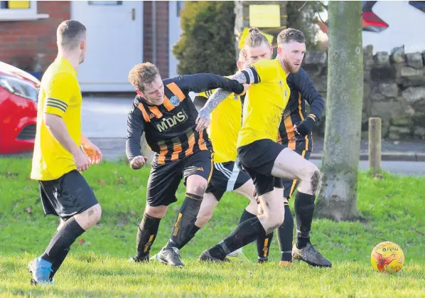  ??  ?? AT THE DOUBLE: Niall Mcglade scored twice as The Kiln beat Birches Head 4-3 in a thrilling encounter at the weekend.