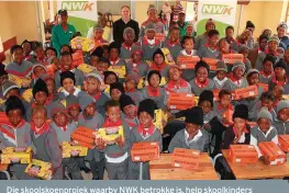  ?? FOTO: NWK ?? Die skoolskoen­projek waarby NWK betrokke is, help skoolkinde­rs om met meer waardighei­d en beskermde voete skool toe te gaan. Die projek het in sewe jaar al 3 700 kinders gehelp.
