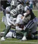  ?? BILL KOSTROUN — THE ASSOCIATED PRESS ?? Jets Doug Middleton (36), Brandon Copeland (51) and Darron Lee (58) tackle Miami’s’ Albert Wilson (15) during last week’s game. The Associated Press