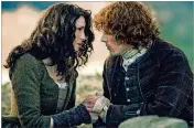  ?? PHOTO BY STARZ ?? Caitriona Balfe as Claire (left) and Sam Heughan as Jamie in “Outlander.”