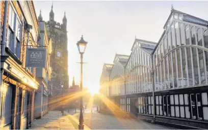  ??  ?? ●●Stockport market at sunrise John Varley