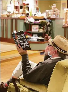  ?? Courtesy of RJ Julia Bookseller­s ?? A customer browses at RJ Julia Bookseller­s.