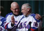  ?? MIKE GROLL — THE ASSOCIATED PRESS, FILE ?? Jack O’Callahan, left, and Mark Pavelich of the 1980 U.S. ice hockey team talk during a “Relive the Miracle” reunion at Herb Brooks Arena in Lake Placid, N.Y., in February 2015. Pavelich, 63, died at the Eagle’s Healing Nest in Sauk Centre, Minn., Thursday morning. The cause and manner of death are still pending.