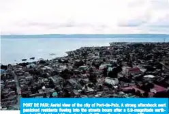  ??  ?? PORT DE PAIX: Aerial view of the city of Port-de-Paix. A strong aftershock sent panicked residents fleeing into the streets hours after a 5.9-magnitude earthquake killed at least 12 people along Haiti’s northwest coast. —AFP