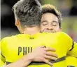  ?? DPA-BILD: THISSEN ?? Sieg: Raphael Guerreiro (rechtsU jubelt mit mit Maximilian Philipp