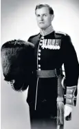  ??  ?? Llewellyn wearing his regimental tunic with his MC and campaign medals; he later became a clotted-cream maker, pig farmer and stockbroke­r