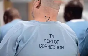  ?? ?? Inmates listen during a graduation ceremony for veterans in prison at Trousdale Turner Correction­al Facility.