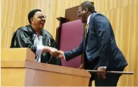  ?? ?? CCC secretary general Sengezo Tshabangu shakes hands with Senate President, Cde Marble Chinomona, as is the parliament­ary protocol for new legislator­s after being sworn-in yesterday