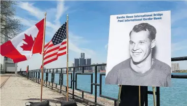  ?? DAVE CHIDLEY / THE CANADIAN PRESS FILES ?? A photo of hockey great Gordie Howe was unveiled at the announceme­nt that the new Windsor-Detroit bridge will be named the Gordie Howe Internatio­nal Bridge.