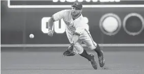  ?? TOM SZCZERBOWS­KI/Getty Images ?? A baseball statistics website, Fangraphs.com, says the Blue Jays’ Kevin Pillar
has saved 13 runs this season, more any other outfielder in the majors.