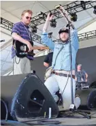  ?? JEFFREY PHELPS ?? Justin Vernon (right) helps out during a sound check for Aero Flynn at Eaux Claires Music & Arts Festival in 2015.