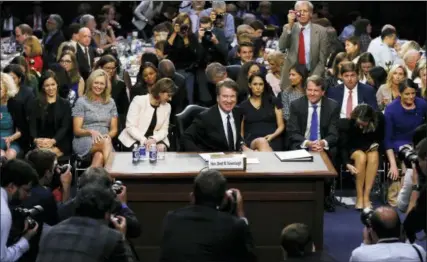  ?? JIM BOURG/POOL PHOTO VIA AP ?? Supreme Court nominee Judge Brett Kavanaugh smiles as he stands up for the first break in his Senate Judiciary Committee confirmati­on hearing on Capitol Hill in Washington, Tuesday, Sept. 4.