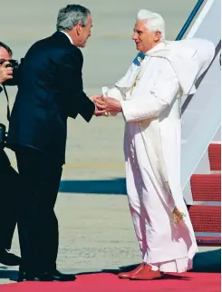  ?? DOUG MILLS/THE NEW YORK TIMES FILE PHOTO ?? Pope Benedict XVI is greeted by President George W. Bush upon his arrival at Andrews Air Force Base in Maryland in 2008.