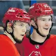  ?? CHRIS O’MEARA/THE ASSOCIATED PRESS ?? Carolina Hurricanes rookie Andrei Svechnikov, right, with Valentin Zykov, is off to a good start.