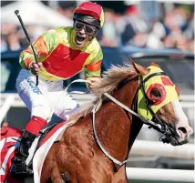  ?? PHOTO: GETTY IMAGES ?? Michael Walker celebrates Mighty Boss’ upset victory in the Caulfield Guineas.