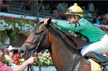  ?? NYRA PHOTO ?? King Kreesa, with Irad Ortiz Jr. aboard, stands in the winner’s circle at Saratoga Race Course Aug. 24, 2014 after winning the West Point Stakes. King Kreesa will take part in this afternoon’s New York Showcase Day.