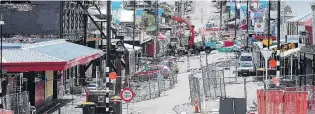  ?? PHOTO: CRAIG BAXTER ?? Lost memories . . . Lyttelton’s London St is lined with safety fences and redsticker­ed buildings following the 2011 earthquake.