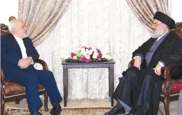  ?? (Hezbollah Media Office/Reuters) ?? LEBANON’S HEZBOLLAH leader Sayyed Hassan Nasrallah meets with Iran’s Foreign Minister Mohammad Javad Zarif earlier this year.