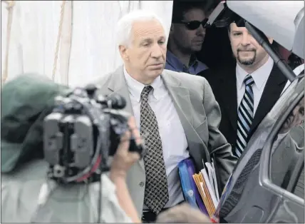  ?? GARY CAMERON ?? Former Penn State assistant football coach Jerry Sandusky leaves curt after day one of his trial in Bellefonte, Pa. Sandusky faces 52 counts of sexual abuse against 10 boys over 15 years. Court heard from one of his alleged victims on Monday.