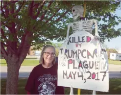  ??  ?? MCHENRY, Illinois: In this May 11, 2017 photo, Jeannie Scown protests outside US Rep. Randy Hultgren’s office. — AP