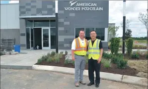  ?? PAUL WELITZKIN / CHINA DAILY ?? Above: Michael Kephart (left), president of American Wonder Porcelain and Jianping Huang, chairman and president of The Wonderful Group, outside of the American Wonder Porcelain plant in Lebanon, Tennessee.