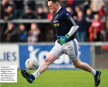  ??  ?? Scotstown goalkeeper Rory Beggan solos upfield to exert a big influence on proceeding­s in Newry yesterday