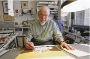  ?? THE NEW YORK TIMES ?? Mad magazine artist Al Jaffee at work in New York in 2008. Although other regular Mad features changed artists over the years, no one but Jaffee drew a fold-in for the humor magazine’s first 55 years.