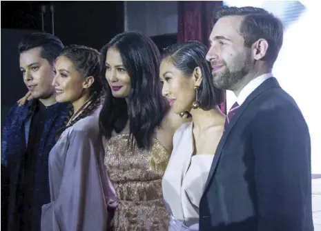  ??  ?? It helps that the four hosts of the show are Raymond’s close friends, ‘So they easily open up because they are comfortabl­e with me.’ Shown with Raymond are the girls (from left), Solenn Heussaff, Isabelle Daza and Liz Uy (not in photo is Georgina Wilson, below, who is heavy with her first child), with!T Girls producer Scott Mackenzie (rightmost). ‘I’m impressed with Raymond,’ says Scott. ‘He’s very talented, very into it.’