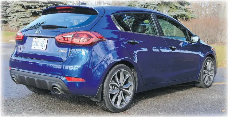  ?? PHOTOS: GRAEME FLETCHER/DRIVING.CA ?? With the rear seats folded down, the 2017 Kia Forte5 hatch gives a flat floor and 1,597 litres of space, impressive for a vehicle in this category.