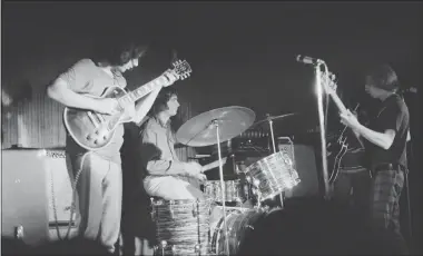  ?? MICHAEL OCHS ARCHIVES — GETTY IMAGES ?? The Grateful Dead — from left, Jerry Garcia, Bill Kreutzmann and Phil Lesh — perform onstage in 1970, when the band was considered more of a jazz-rock experiment­al outfit.