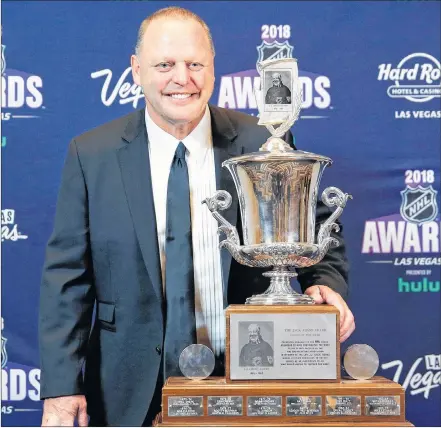  ?? AP PHOTO/JOHN LOCHER ?? Gerard Gallant, head coach of the Vegas Golden Knights, poses with the Jack Adams Award after winning the trophy at the NHL Awards in Las Vegas on Wednesday night.