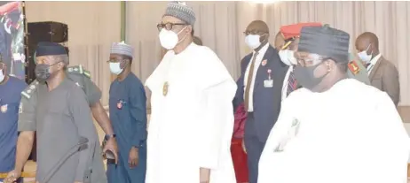  ??  ?? L-R: Vice President Yemi Osinbajo; President Muhammadu Buhari, and Habu Galadima, director-general, National Institute for Policy and Strategic Studies (NIPSS), during Mr President’s parley with participan­ts of NIPSS Senior Executive Course-42 2020 at the Presidenti­al Villa in Abuja, yesterday. NAN