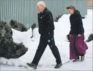  ?? CP PHOTO ?? Gail Blackmore and James Oler arrive at the courthouse in Cranbrook, B.C., Friday. Oler was acquitted but Blackmore and her former husband Brandon Blackmore were found guilty of taking a 13-year-old girl into the U.S. to marry the now jailed head of a...