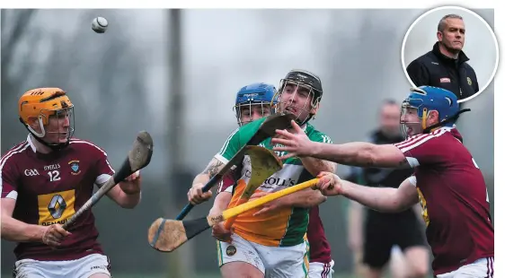  ?? SEB DALY/SPORTSFILE ?? Offaly’s Ciarán Cleary evades Westmeath trio Niall Mitchell (left), Gary Greville (behind), and Derek McNicholas. Inset: Offaly boss Kevin Martin