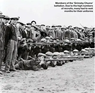  ??  ?? Members of the ‘Grimsby Chums’ battalion. Due to the high numbers of recruits, many had to wait months for their uniforms