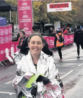  ??  ?? An East Kilbride woman living in England raised over £1000 for Kilbryde Hospice.
Margaret Cripps ran the York Marathon in memory of her mother Rose Batten, who passed away in the Hospice this year.
Margaret said:“Everything about Kilbryde Hospice is fantastic.
“The staff are so kind and they gave my mum her dignity back.
“They looked after not only my mum, but me and my sister Lorraine too.
“The money is definetly going to a cause close to my heart.”
Margaret had never ran a marathon before, so it was a challenge to herself.
She moved to England around 22 years ago when she started working at Manchester University as a scientific researcher.
She is now an A-Level chemistry teacher at a sixth form college.
Margaret also plans on running the Kilbryde Hospice Santa Dash with her sister in December.