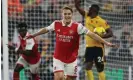  ?? Photograph: Matthew Ashton/AMA/Getty Images ?? Martin Ødegaard celebrates after scoring Arsenal’s first goal against Wolves.