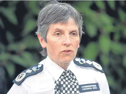  ?? PA. ?? Metropolit­an Police Commission­er Cressida Dick was handed the documents after an interview.