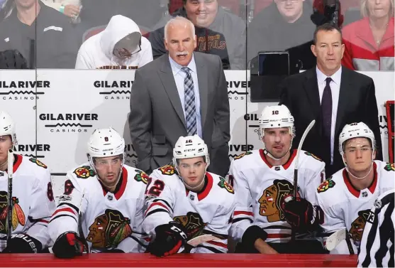  ?? CHRISTIAN PETERSEN/ GETTY IMAGES ?? The Blackhawks’ Joel Quennevill­e is nearing the end of the first losing season of his 21- year coaching career. The Hawks’ last game is Saturday.