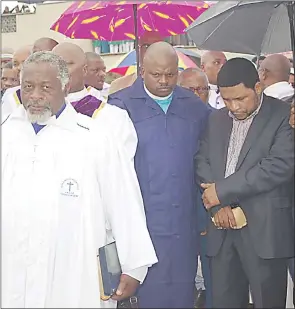  ?? ?? All Nations Christian Church in Zion leader Archbishop Bheki Lukhele overcome with emotion during the burial of his wife.