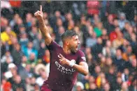  ?? REUTERS ?? Sergio Aguero celebrates scoring the first goal of his hat-trick in Manchester City’s 6-0 drubbing of Watford last Saturday as the Argentine continued his scintillat­ing early-season form.