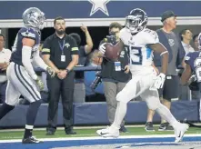  ?? ASSOCIATED PRESS ?? FAMILIAR FOE: Dion Lewis scores a touchdown during Monday night’s game against the Cowboys. The Titans running back will face his former team next when the Patriots travel to Tennessee on Sunday.