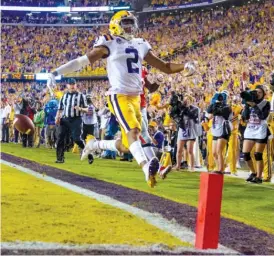  ?? AP ?? LSU’s Justin Jefferson revved up the fans in Baton Rouge by soaring into the end zone this season. Georgia will have to contend with Death Valley on Saturday.