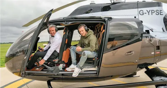  ?? ?? Alfie inside the seven-seat 007 chopper with his son, Alfie Best Junior.