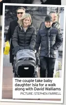 ?? PICTURE: STEPHEN FARRELL ?? The couple take baby daughter Isla for a walk along with David Walliams