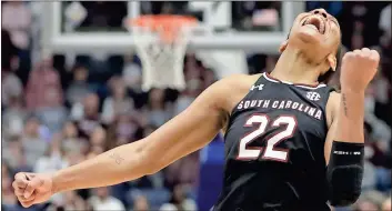  ?? Mark Humphrey / AP ?? South Carolina forward A’ja Wilson celebrates after her team defeated Mississipp­i State in the women’s SEC tournament.