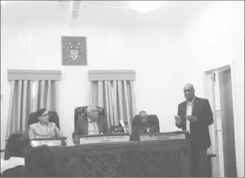  ??  ?? Minister of State Joseph Harmon speaking during the dedication ceremony for the Public Service Appellate Tribunal on Friday. Seated from left to right are tribunal member Abiola Wong-Inniss, Justice (Rtd) Nandram Kissoon and Winston Browne