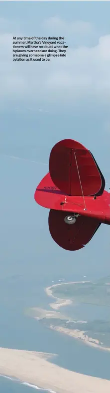  ??  ?? At any time of the day during the summer, Martha’s Vineyard vacationer­s will have no doubt what the biplanes overhead are doing. They are giving someone a glimpse into aviation as it used to be.